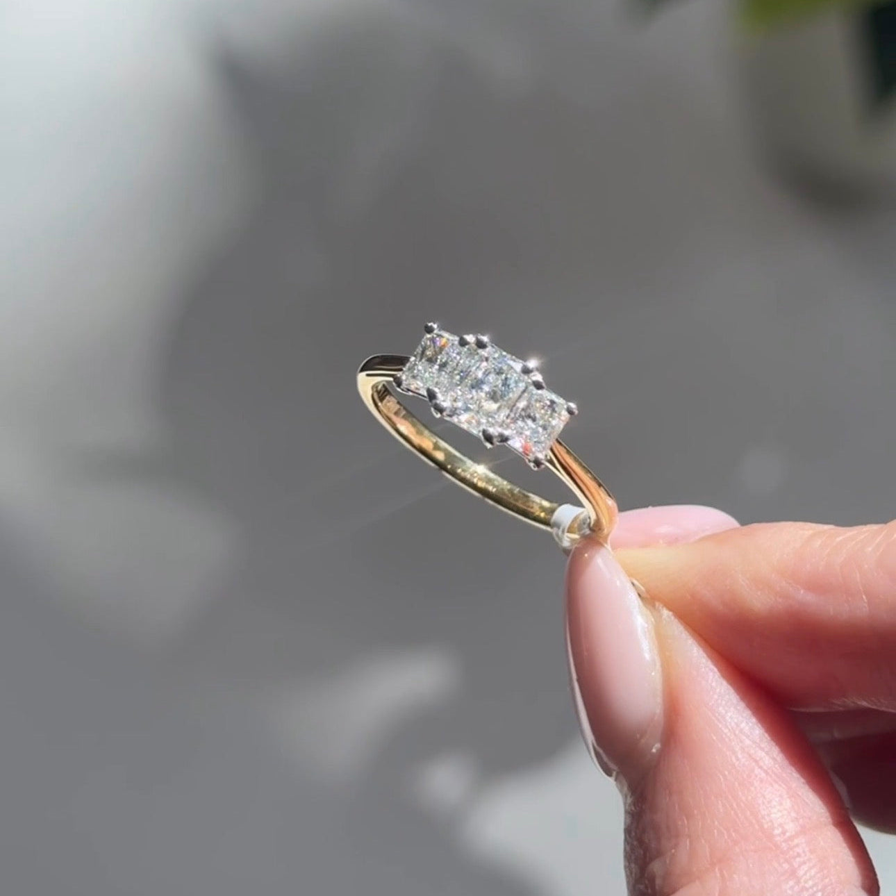 New Arrival at Harrogate Jewellers A Radiant Cut Diamond Trilogy Ring
