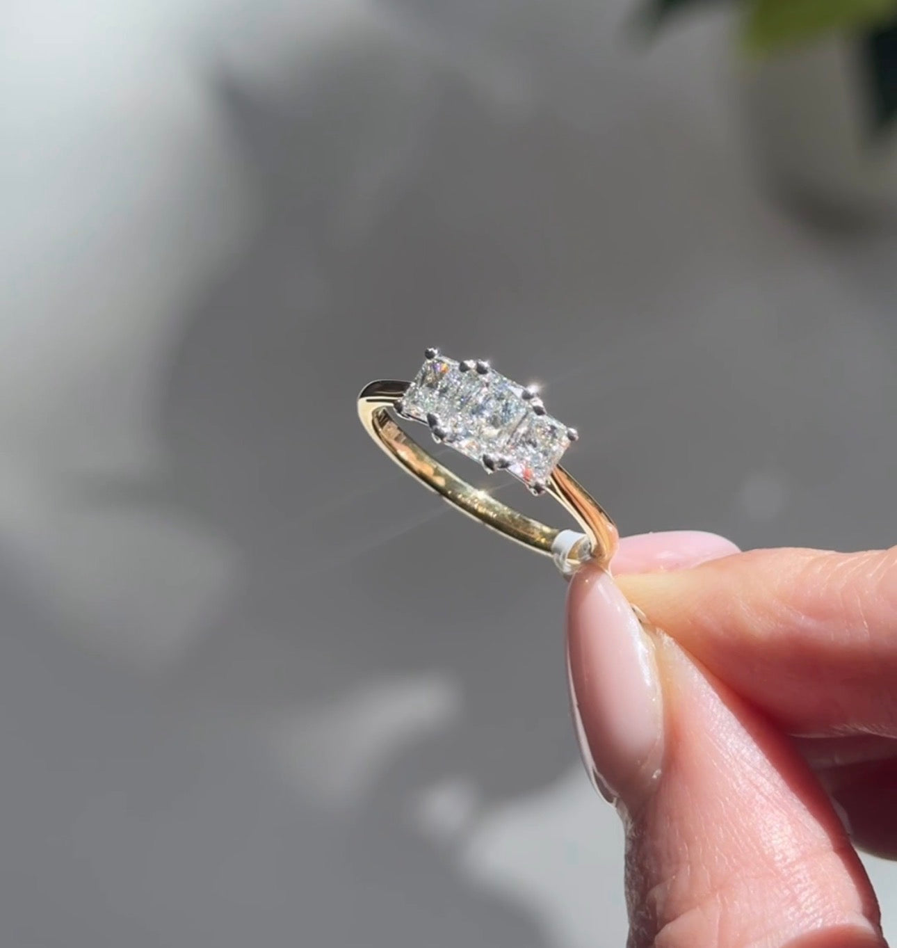 New Arrival at Harrogate Jewellers A Radiant Cut Diamond Trilogy Ring