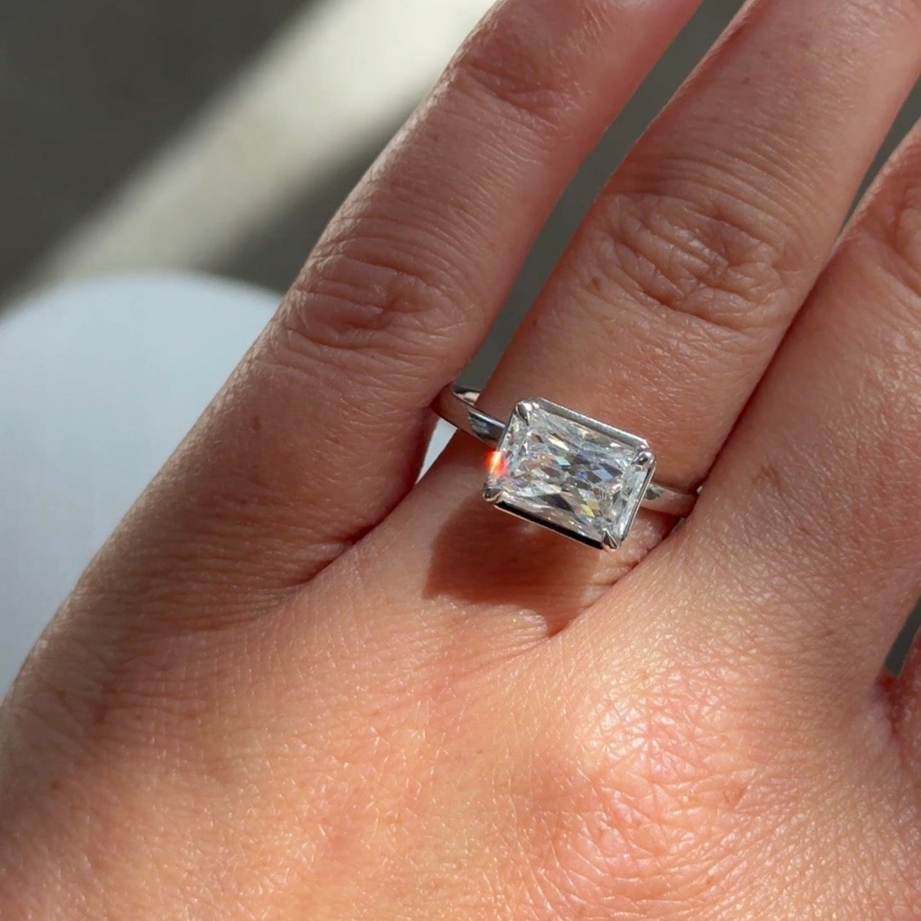 Sideways, On Purpose: Why East-West Engagement Rings Are Having a Moment