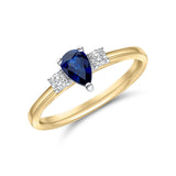 Pear Cut Sapphire and Diamond Engagement Ring by Harrogate Jewellers, crafted in Yellow Gold. Perfect for bespoke jewellery lovers in Harrogate, Yorkshire.