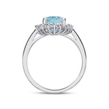 Oval Cut Aquamarine and Diamond Halo Ring in 18ct White Gold from Harrogate Jewellers, a bespoke piece perfect for engagements or weddings in Yorkshire.