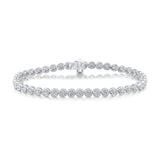 Diamond Rub-Over Set Tennis Bracelet by Harrogate Jewellers, showcasing brilliant lab grown diamonds arranged symmetrically in 18ct white gold. Ideal bespoke jewellery for weddings or engagements in Yorkshire.