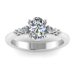 Harrogate Jewellers' ORIANNA ring featuring a lab-grown oval cut solitaire diamond surrounded by mixed cut diamond shoulders, crafted in white gold or platinum.