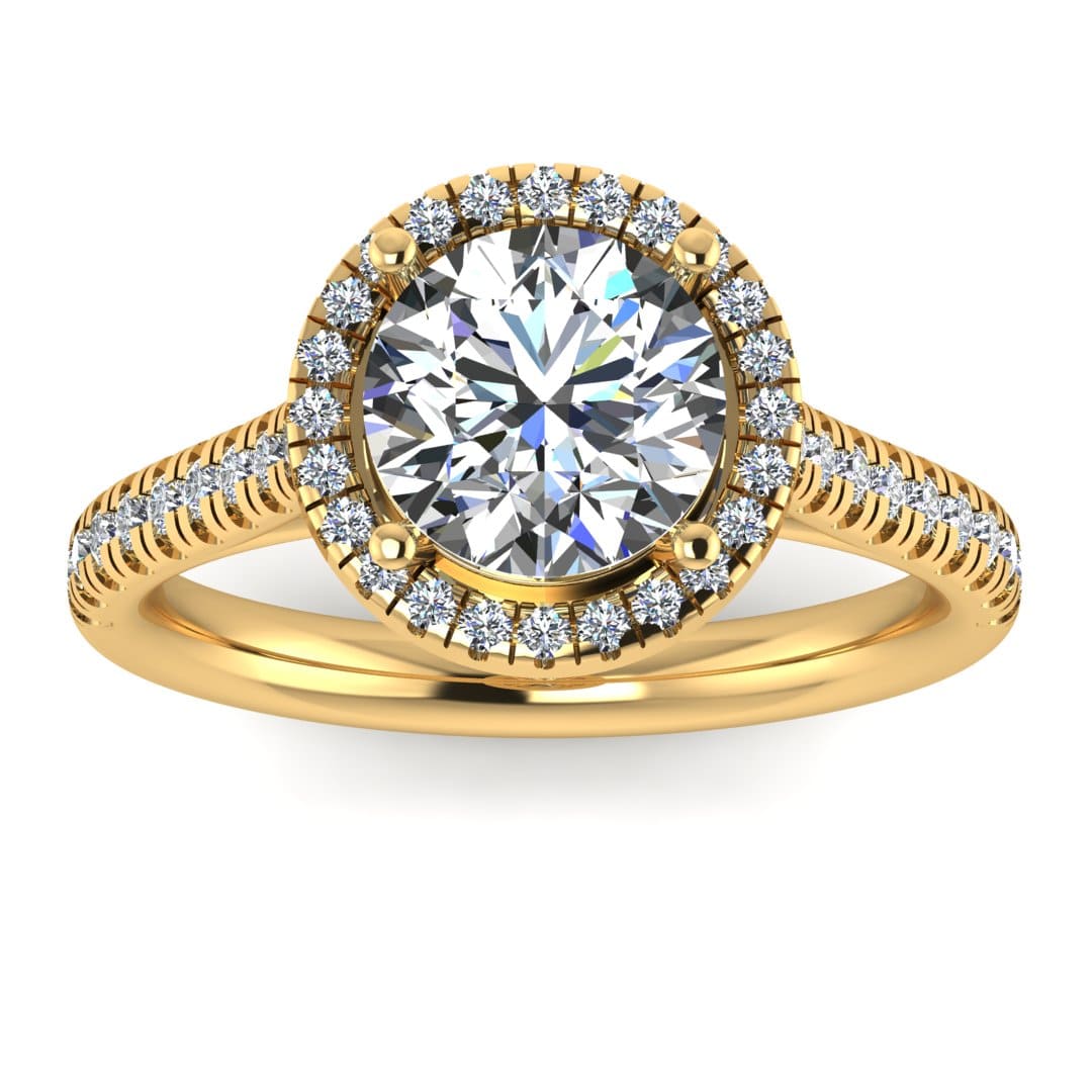 Harrogate Jewellers' DELPHINE lab-grown diamond engagement ring, featuring a classic round brilliant cut diamond in a halo setting, on a white gold band, against a white backdrop.