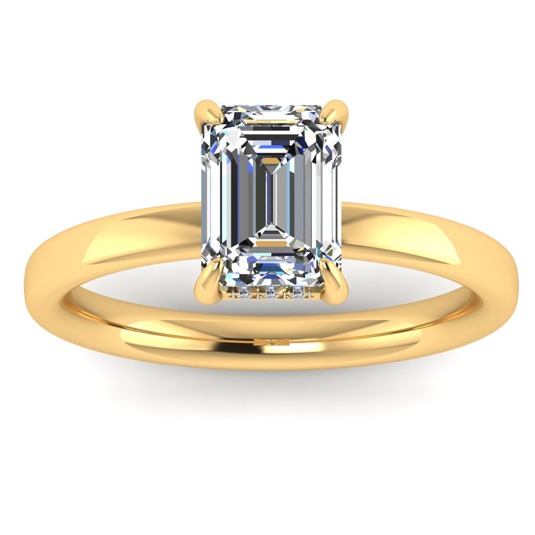 Emerald cut solitaire lab-grown diamond ring, with hidden halo detail, set in white gold by Harrogate Jewellers, a bespoke Yorkshire jewellery vendor.