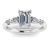 Harrogate Jewellers' CLARA lab-grown emerald cut solitaire ring with mixed cut diamond shoulders, platinum setting against a white background.