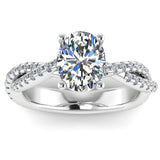 SOPHIA - Lab-Grown Oval Cut Diamond Twisted Diamond Shoulders ring by Harrogate Jewellers, featuring a large oval-cut earth mined diamond, intricately set in white gold with a twist design of smaller diamonds along the band.