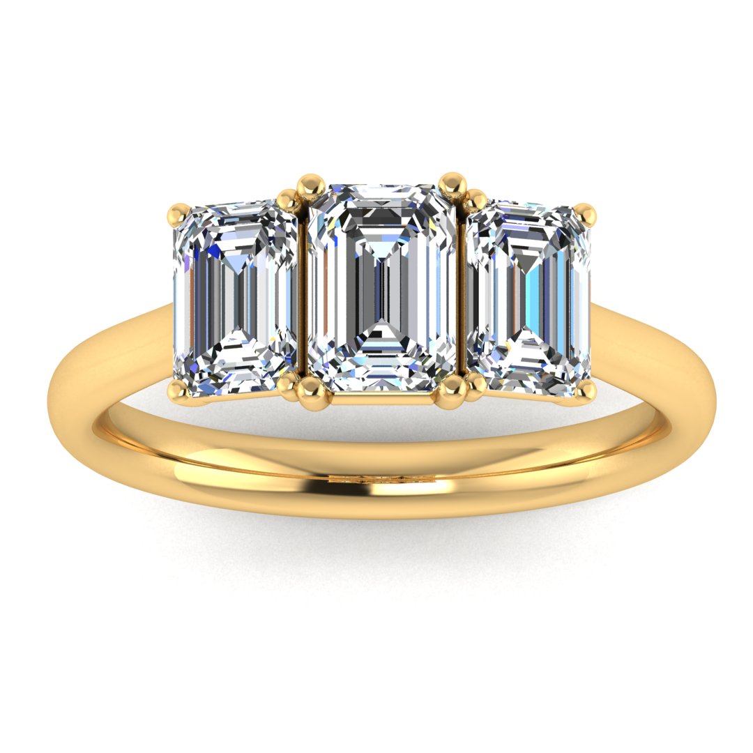 Harrogate Jewellers' TAYLOR lab-grown emerald cut diamond trilogy ring in white gold, reflecting bespoke Yorkshire craftsmanship and sustainable luxury.