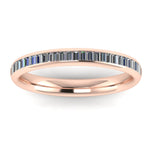 Baguette Cut Half Set Diamond Eternity Ring by Harrogate Jewellers, a perfect choice for engagement or wedding, crafted in platinum with channel set diamonds in a uniform design.