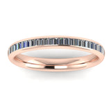 Baguette Cut Half Set Diamond Eternity Ring by Harrogate Jewellers, a perfect choice for engagement or wedding, crafted in platinum with channel set diamonds in a uniform design.