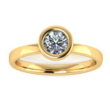 Harrogate Jewellers' SOLACE lab-grown round brilliant cut bezel set engagement ring, featuring a high-quality, sustainable diamond on a platinum band, against a white background.