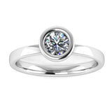 Harrogate Jewellers lab-grown round brilliant cut bezel set engagement ring in platinum with earth-mined diamond, bespoke jewellery in Yorkshire.