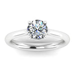 Close-up view of Harrogate Jewellers' MOLLY - Low Set Lab-Grown Diamond Solitaire Engagement Ring, a white gold ring featuring a round brilliant-cut diamond, set in a four-claw setting on a stark white background.