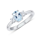 Oval Cut Aquamarine Diamond Trilogy Ring in 18ct White Gold by Harrogate Jewellers, a bespoke lab-grown diamond ring perfect for engagements or weddings.