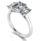 Emerald cut lab-grown diamond trilogy ring by Harrogate Jewellers, perfect for engagement or wedding, set in white gold, symbolizing past, present, and future.