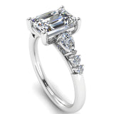 Harrogate Jewellers' CLARA Lab Grown Emerald Cut Solitaire ring with mixed cut Diamond Shoulders in platinum, perfect for Earth Mined Diamond Wedding Rings in Yorkshire.