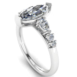 Harrogate Jewellers' lab grown marquise cut solitaire, adorned with mixed cut diamond shoulders, set in platinum, bespoke engagement ring from Yorkshire.