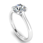 Round Brilliant Cut Solitaire Engagement Ring by Harrogate Jewellers, featuring a natural earth mined diamond in a talon claw setting, crafted from white gold.