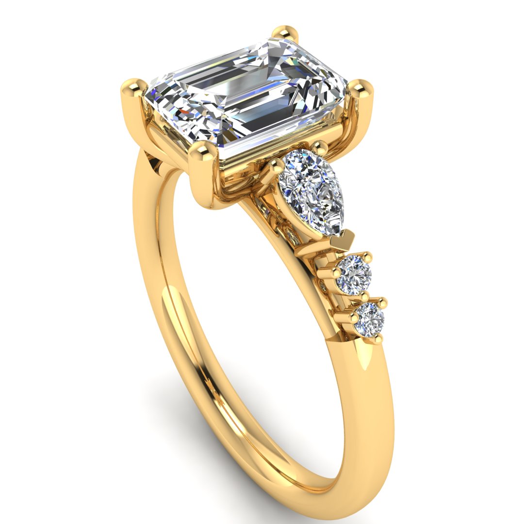 Emerald cut lab grown diamond solitaire ring with mixed cut diamond shoulders by Harrogate Jewellers, a bespoke Yorkshire jewellery vendor specializing in Earth Mined Diamonds Wedding Rings.