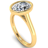 Harrogate Jewellers' ELARA lab-grown oval cut diamond engagement ring, bezel set in platinum, showcasing bespoke Yorkshire craftsmanship.