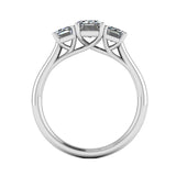 Emerald cut, lab-grown diamond trilogy ring from Harrogate Jewellers, showcasing three stones set in platinum against a white background.