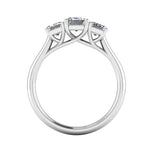 Harrogate Jewellers' TAYLOR lab-grown emerald cut diamond trilogy ring, set in white gold, featuring a large central diamond flanked by two smaller diamonds.