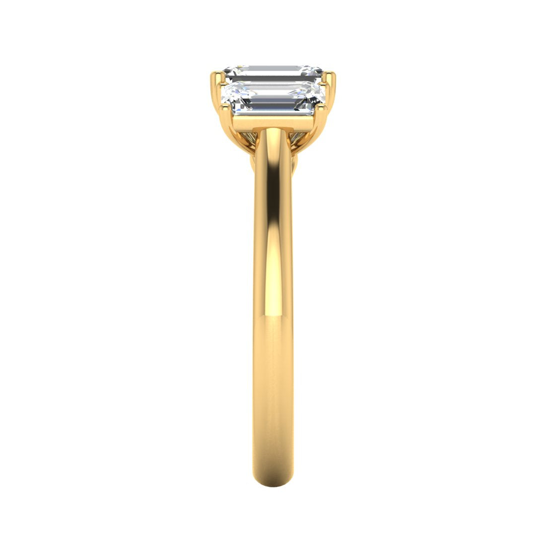 Harrogate Jewellers' TAYLOR - Lab-Grown Emerald Cut Diamond Trilogy Ring, set in platinum, showcasing bespoke jewellery craftsmanship from Yorkshire, perfect for earth-mined diamond engagement rings.