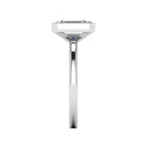 Harrogate Jewellers' Vivienne lab-grown emerald cut engagement ring, bezel set in platinum with a delicate band, perfect for bespoke Yorkshire weddings.