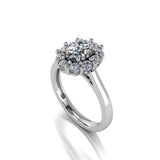 Harrogate Jewellers' lab-grown oval cut diamond flower halo ring, perfect for engagement or bespoke jewellery in Harrogate, Yorkshire, showcasing earth mined diamond quality.