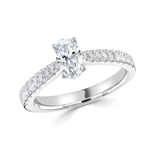Oval cut diamond engagement ring with tapered diamond shoulders, 0.75ct, from Harrogate Jewellers. Hand-selected natural earth mined diamond in a platinum band. Bespoke jewellery from Yorkshire.