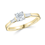 Harrogate Jewellers' exquisite 0.50ct round brilliant cut diamond trilogy ring with tapered baguette cut diamonds on platinum band, perfect for bespoke engagement and wedding jewellery in Yorkshire.