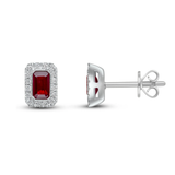 Octagonal cut ruby and diamond halo earrings by Harrogate Jewellers, made of white gold. Bespoke jewellery from Yorkshire.