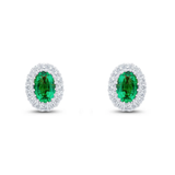 Oval cut emerald and diamond halo earrings by Harrogate Jewellers, made with white gold. Bespoke, Earth mined diamond jewellery in Harrogate, Yorkshire.