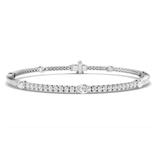 Diamond Tennis Bracelet by Harrogate Jewellers featuring Round Brilliant & Marquise Cut Diamonds, set in white gold against a white background