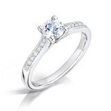 Harrogate Jewellers' Round Brilliant Cut Diamond Engagement Ring with Grain Set Shoulders, bespoke jewellery in Yorkshire, featuring laboratory grown diamonds on a wedding ring.