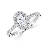 Oval cut diamond halo shoulder set engagement ring by Harrogate Jewellers, a bespoke piece of Yorkshire jewellery featuring lab grown diamonds.