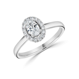 Oval Cut Claw Set Diamond Halo Engagement Ring by Harrogate Jewellers, a bespoke piece in Harrogate, Yorkshire. Ideal for weddings and symbolising lab grown diamonds.