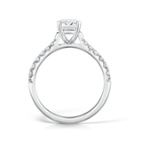 Harrogate Jewellers' lab grown diamond engagement ring with a tapered claw set emerald cut, bespoke design, set in silver, viewed from a side angle.