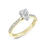 Tapered claw pear cut diamond engagement ring by Harrogate Jewellers, Yorkshire, featuring lab grown diamonds on a gold band, bespoke jewellery for weddings.