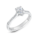 Pear Cut Diamond Engagement Ring with Channel Set Shoulders by Harrogate Jewellers, showcasing bespoke jewellery craftsmanship from Yorkshire. Lab grown diamonds on a silver band.