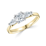 Round Brilliant Cut Pear Cut Diamond Trilogy Ring from Harrogate Jewellers, symbolising past, present, and future. Ideal for engagements and bespoke Yorkshire wedding rings.