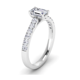 Emerald cut lab-grown diamond set on platinum band with classic diamond shoulders, from Harrogate Jewellers, Yorkshire's bespoke jewellery expert.