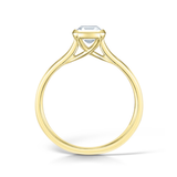 Harrogate Jewellers emerald cut solitaire diamond engagement ring, bezel set in platinum, reflecting Yorkshire bespoke jewellery craftsmanship.