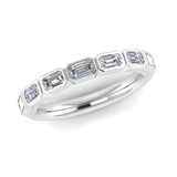 Emerald Cut Rubover Eternity 7-Stone Diamond Ring by Harrogate Jewellers, featuring bezel set earth mined diamonds on a platinum band, bespoke jewellery in Yorkshire.