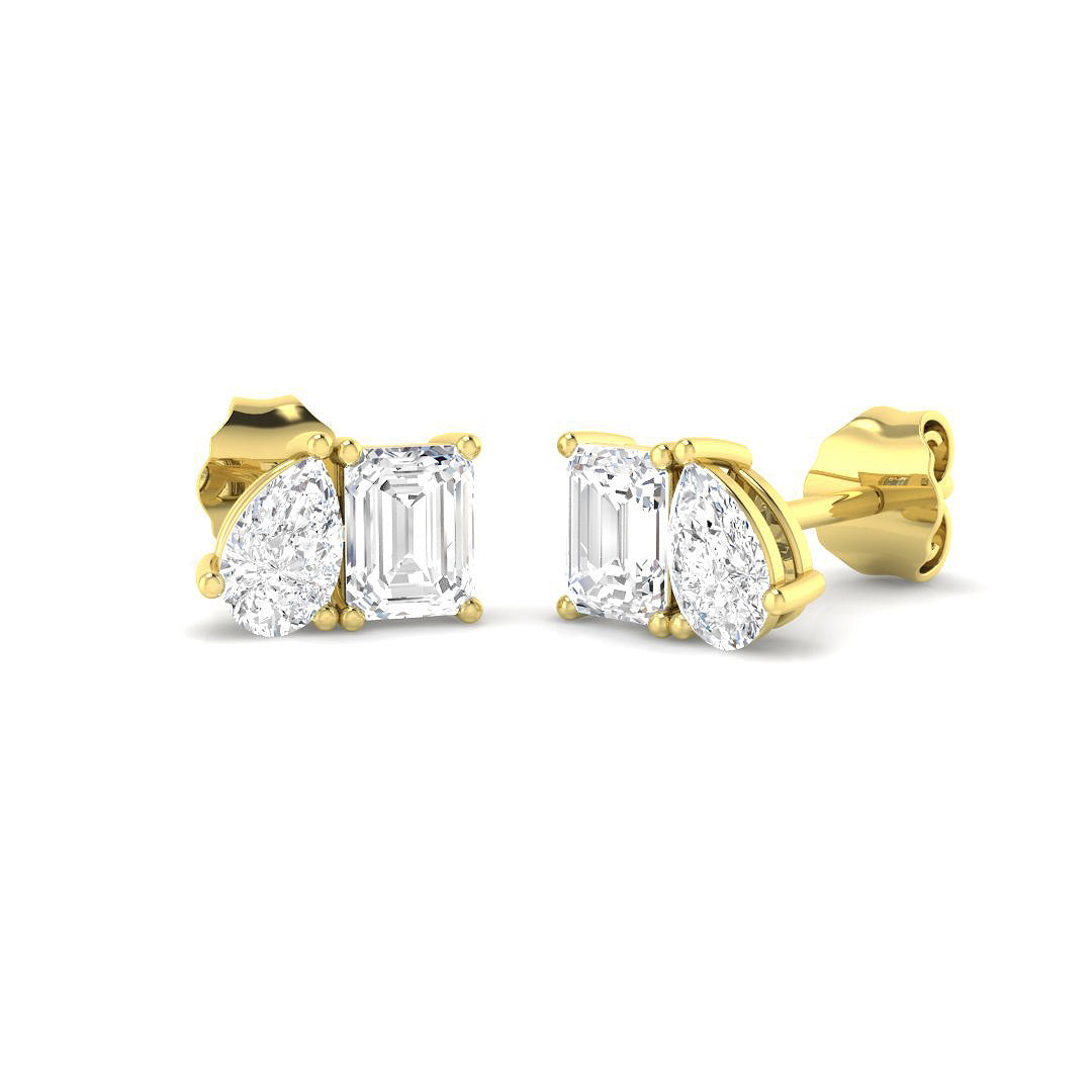 Harrogate Jewellers' Toi et Moi lab-grown diamond earrings featuring emerald and pear cut stones in 9ct yellow or white gold, ideal for bespoke Yorkshire wedding jewellery.