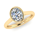 Harrogate Jewellers' ELARA engagement ring featuring a bezel-set, lab-grown oval cut diamond on a sleek platinum band, ideal for bespoke Yorkshire jewellery.