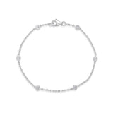Diamond Rub-Over Set Bracelet in White Gold by Harrogate Jewellers, perfect for engagements or weddings. Ideal bespoke jewellery in Harrogate, Yorkshire.