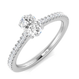 0.58ct Oval Cut Diamond Solitaire Engagement ring in Platinum by Harrogate Jewellers, showcasing a central hand-selected diamond and a delicate pattern of smaller diamonds along the band, Earth Mined Diamonds Wedding Rings, bespoke jewellery in Harrogate, Yorkshire.
