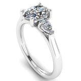 Harrogate Jewellers Oval and Pear Cut Diamond Trilogy Ring 1.22ct, a bespoke engagement ring featuring an earth mined diamond, set in platinum on a white background.