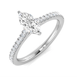 0.75ct Marquise Diamond Solitaire Engagement Ring by Harrogate Jewellers, set in platinum, featuring tapered diamond-set shoulders, against a white background.